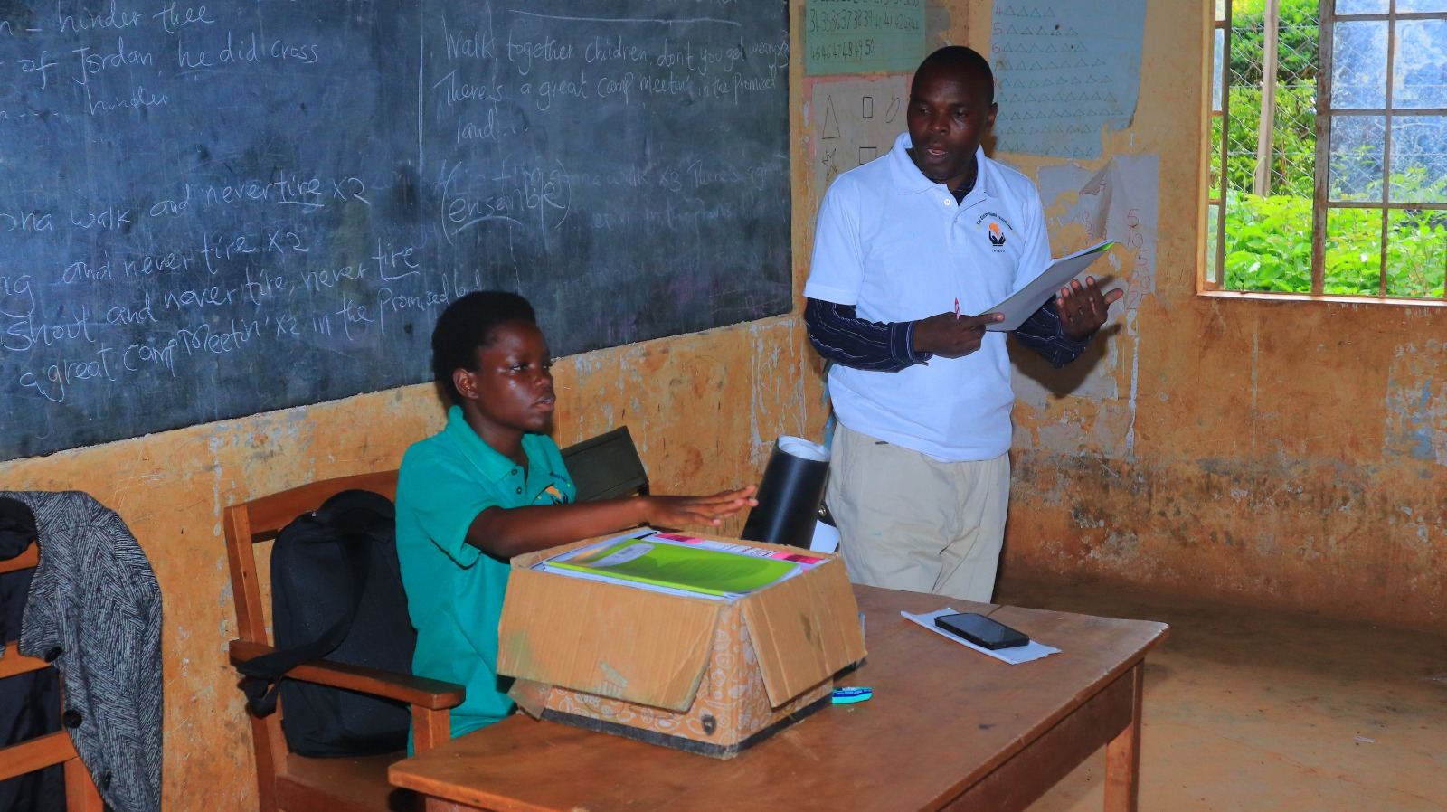 Students receiving school supplies from Steve Thami Foundation
