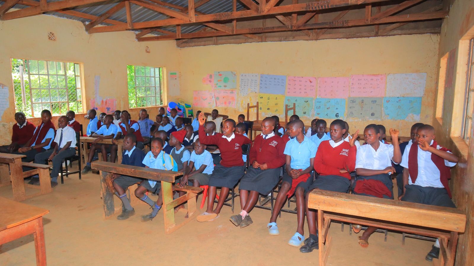Students in school uniforms during Steve Thami Foundation education program in Migori County, Kenya